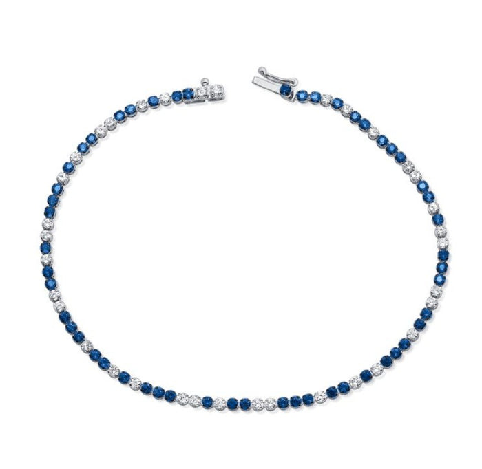 The Karat Concierge sapphire and diamond tennis bracelet in 14K white gold with alternating blue and white stones.