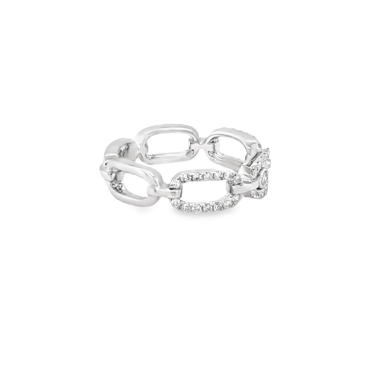 The Karat Concierge 3 stone sliding diamond omega ring in white gold with pave diamonds and a bezel set diamond.