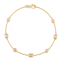 The Karat Concierge Sloane bracelet in 14K yellow gold featuring seven bezel-set natural diamonds on a delicate chain.