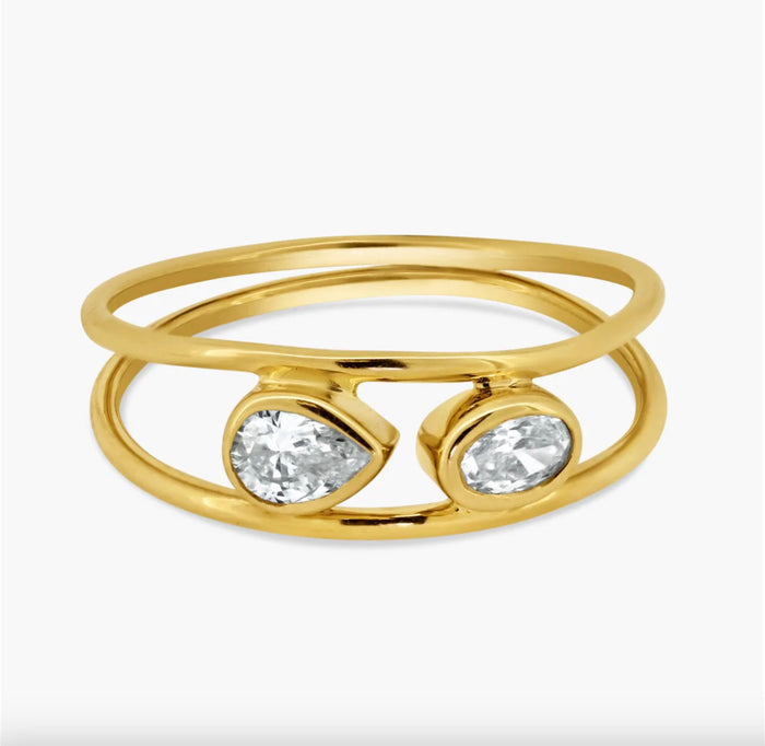 The Karat Concierge 14K yellow gold Toi Et Moi ring featuring bezel set pear and oval diamonds.