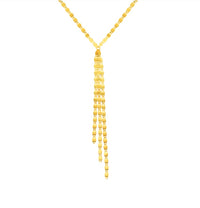 The Karat Concierge Valentino lariat necklace featuring a delicate gold chain with a multi-strand drop design.