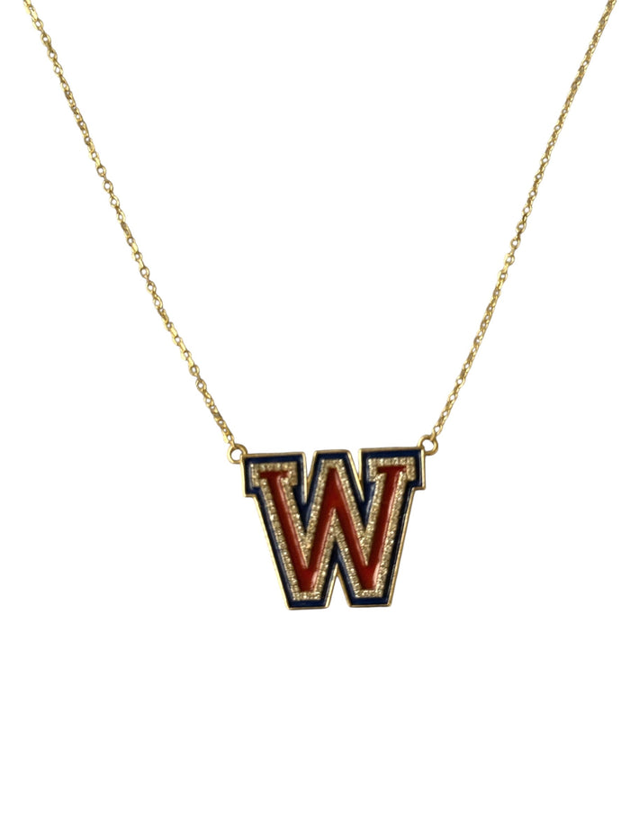 The Karat Concierge Westlake W necklace in yellow gold with red and blue enamel and diamond accents on a delicate chain