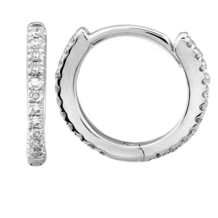 The Karat Concierge 14K white gold eternity diamond huggie earrings with pavé diamonds on front and back.
