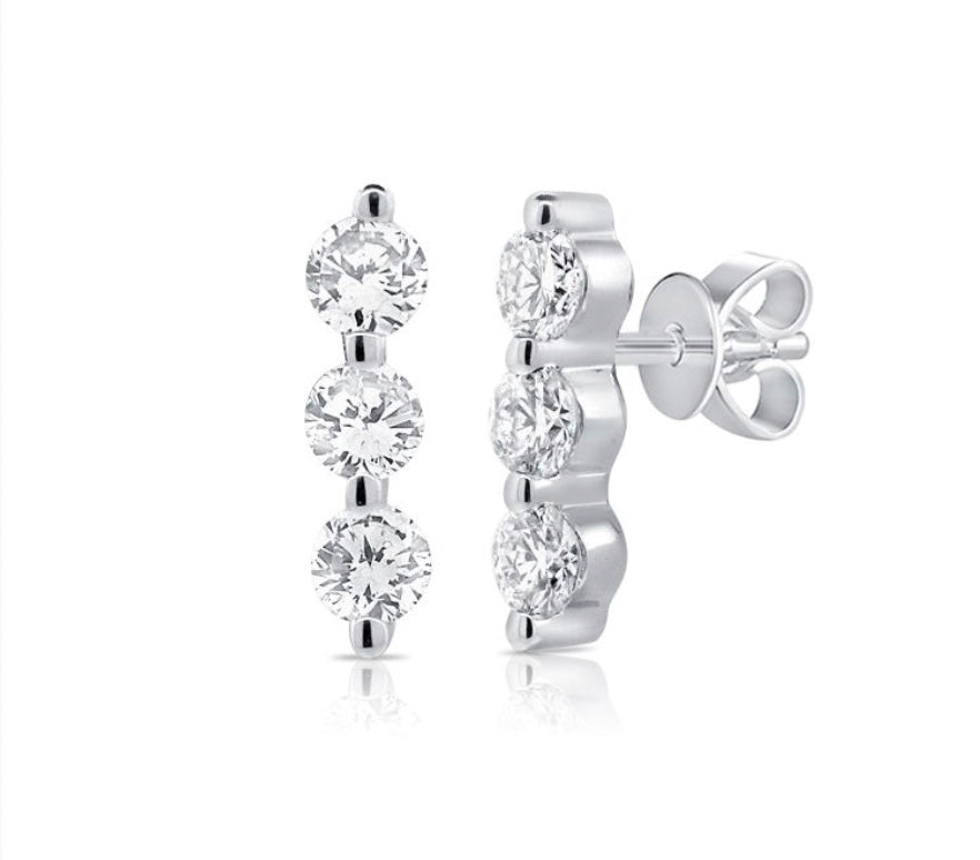 The Karat Concierge 14K white gold trio diamond bar earrings featuring three round diamonds with tension backs.