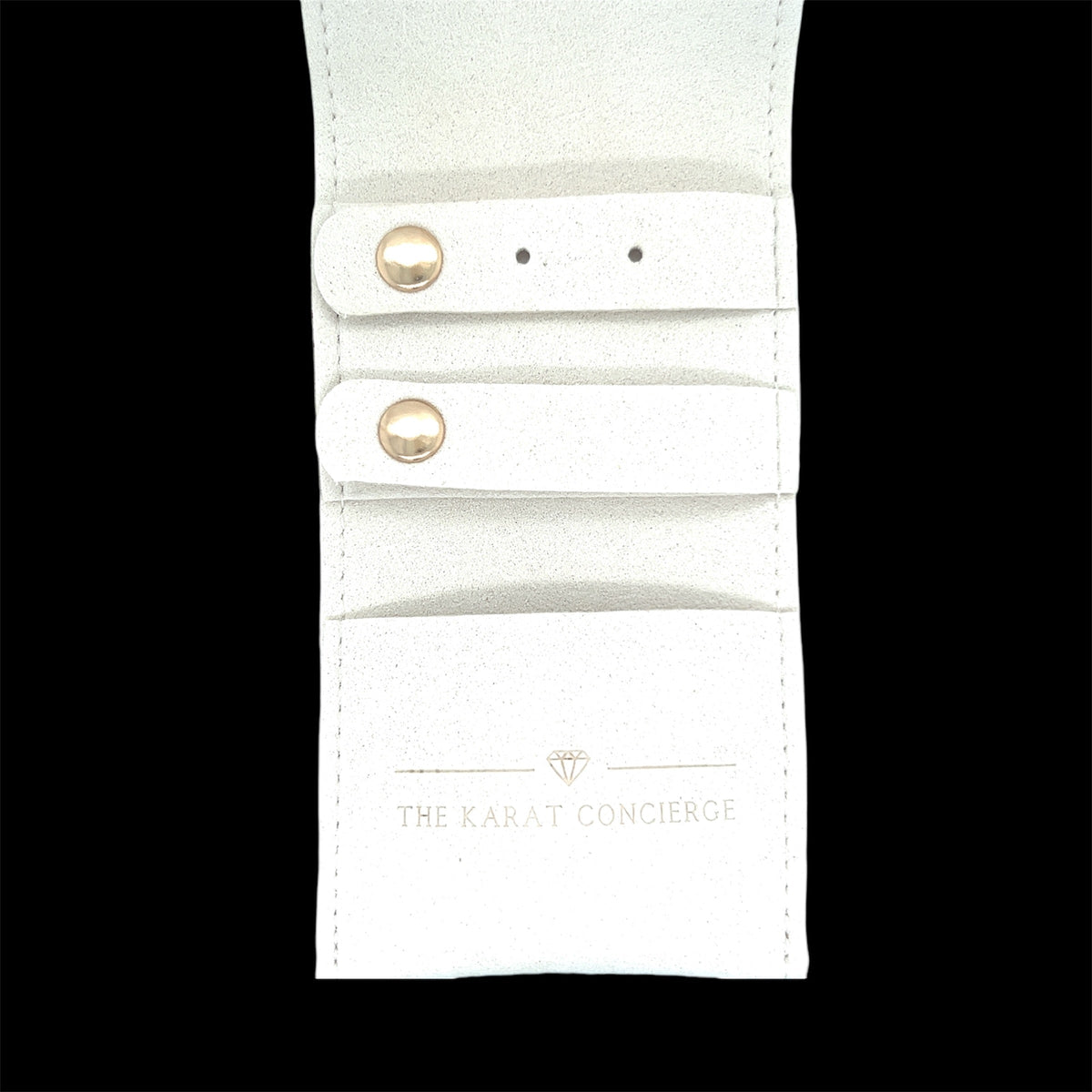 The Karat Concierge white mini travel jewelry case with earring tabs and necklace pocket for organized storage.