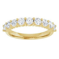 The Karat Concierge round diamond halfway band in 14K yellow gold with a shared prong setting on a white background.