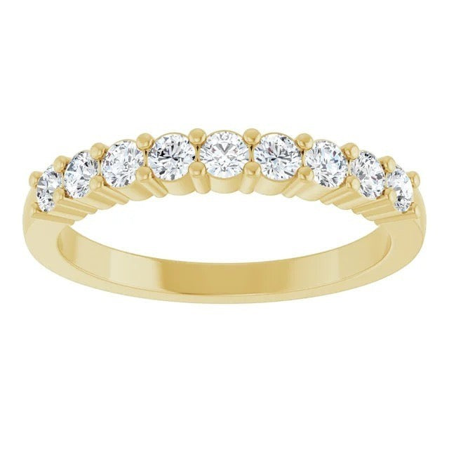 The Karat Concierge round diamond halfway band in 14K yellow gold with a shared prong setting.