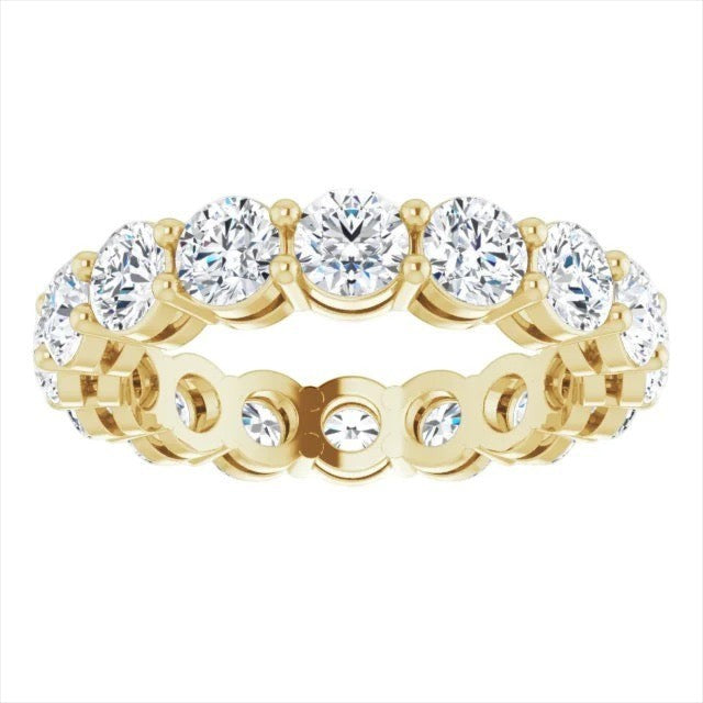 The Karat Concierge round diamond eternity band in 14K yellow gold with a two-prong setting for maximum brilliance.