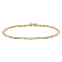 The Karat Concierge yellow gold tennis bracelet featuring 4-prong set diamonds with a secure double safety latch.