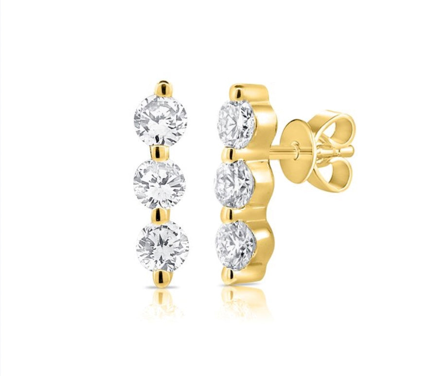 The Karat Concierge 14K yellow gold trio bar earrings featuring three round diamonds with secure tension backs.