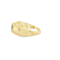 The Karat Concierge 14KT yellow gold ring featuring a 1.50-carat emerald in a smooth bezel setting, side view.