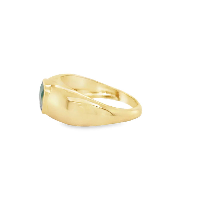 The Karat Concierge 14KT yellow gold ring featuring a 1.50-carat emerald in a smooth bezel setting, side view.