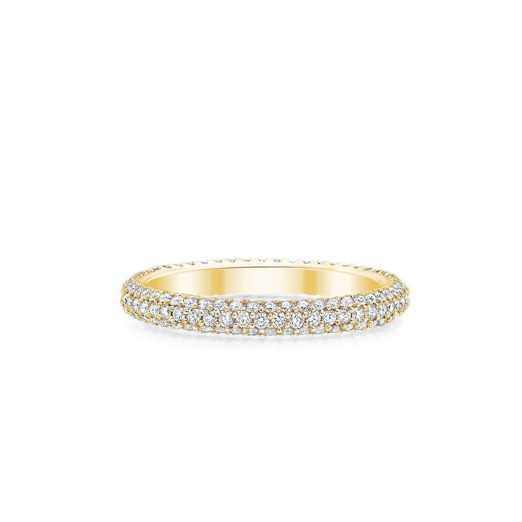 The Karat Concierge pave eternity band in 18K yellow gold with sparkling diamonds set in a triple row design.