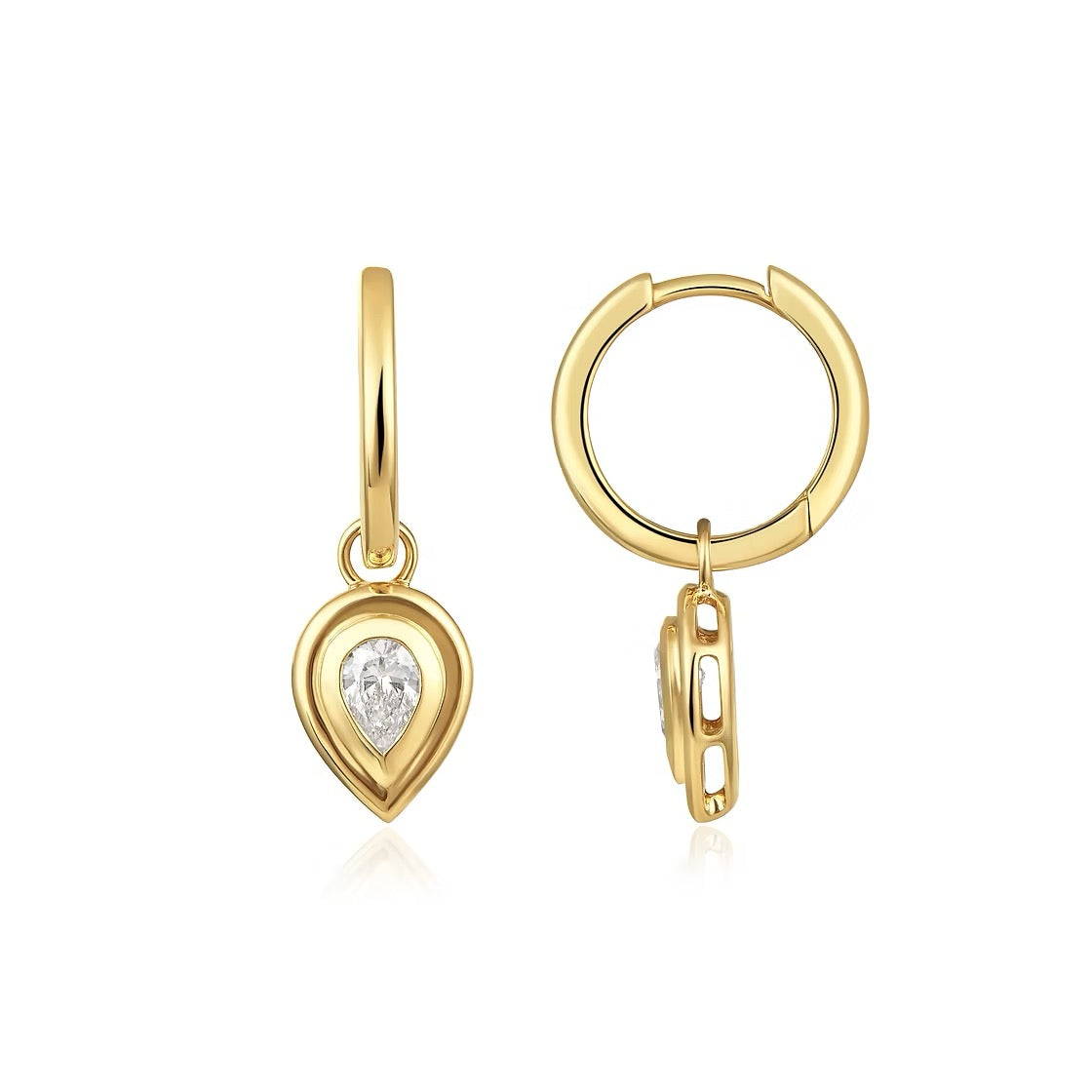 The Karat Concierge yellow gold huggie earrings featuring a .55 CTW pear-shaped diamond in a faceted bezel setting.