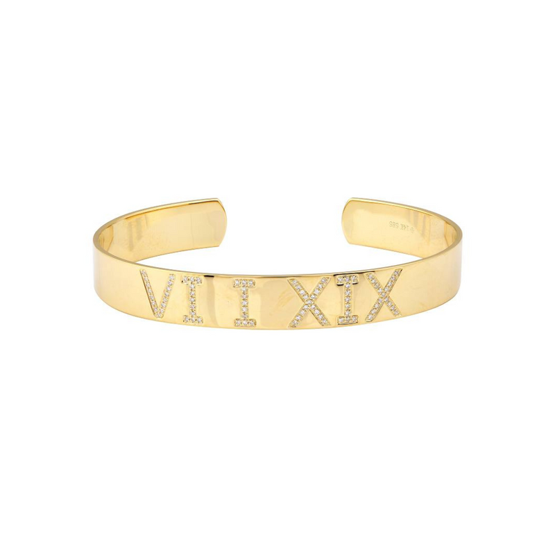 Roman numerals in a custom Cuff Bracelet set with diamonds yellow gold