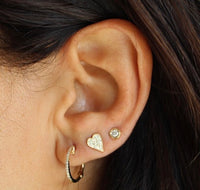 Pave Heart Diamond Stud Earrings on ears 